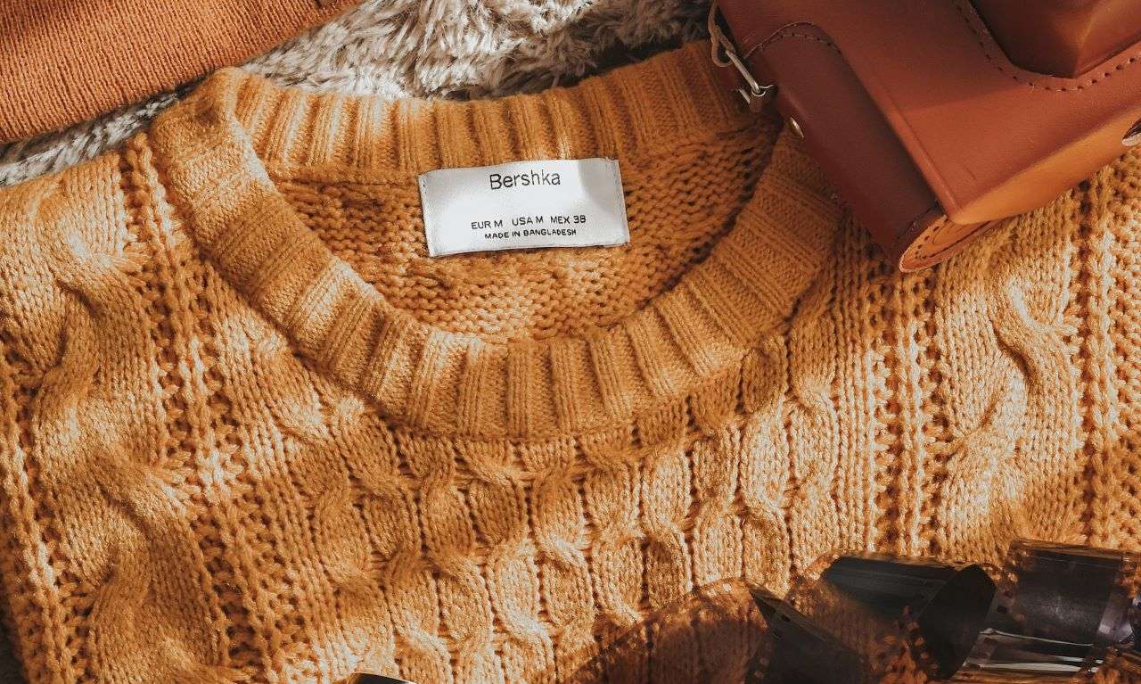 Sweater with a label of Bershka the fast fashion brand owned by Inditex