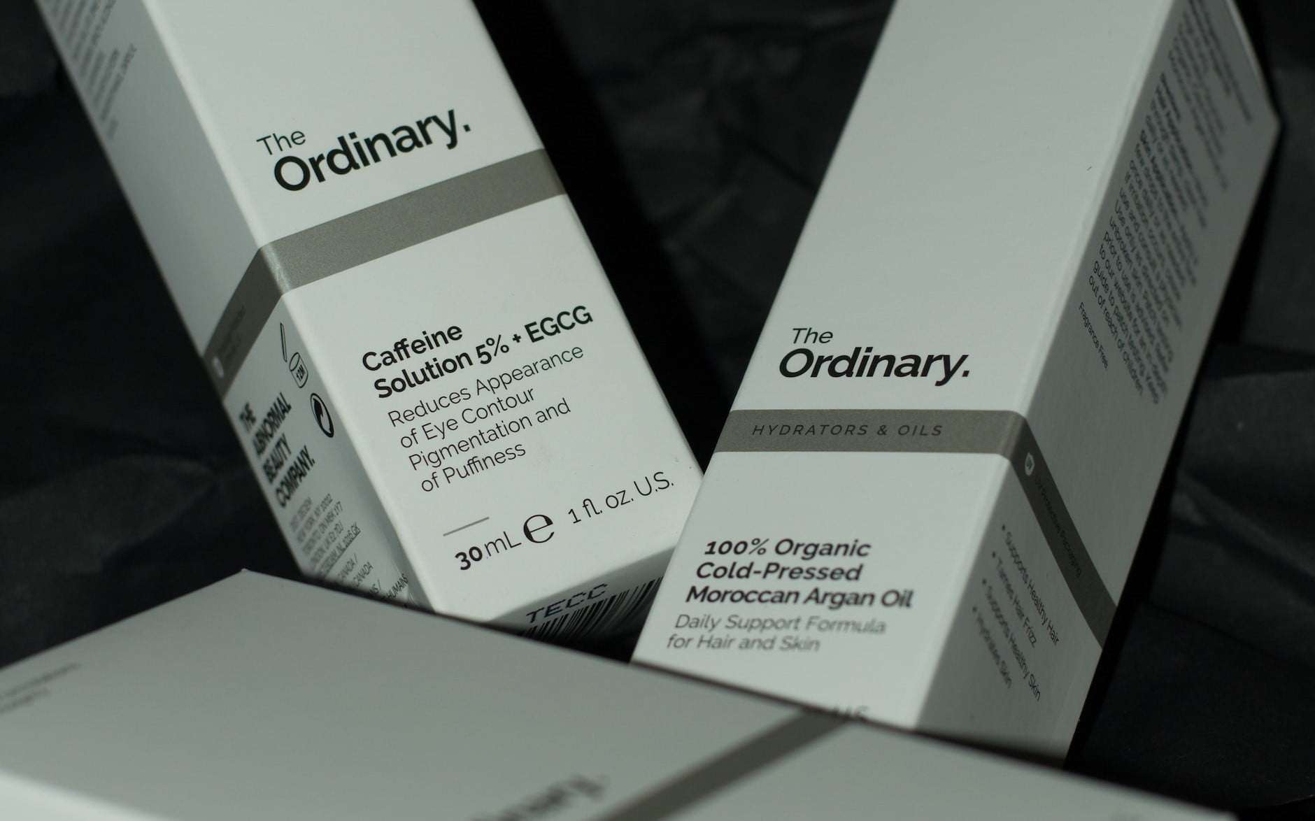 two packages of the skincare brand the Ordinary