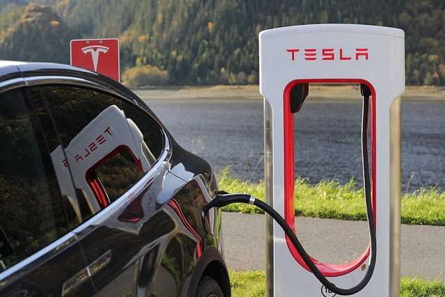 Tesla car charging at EV Tesla station