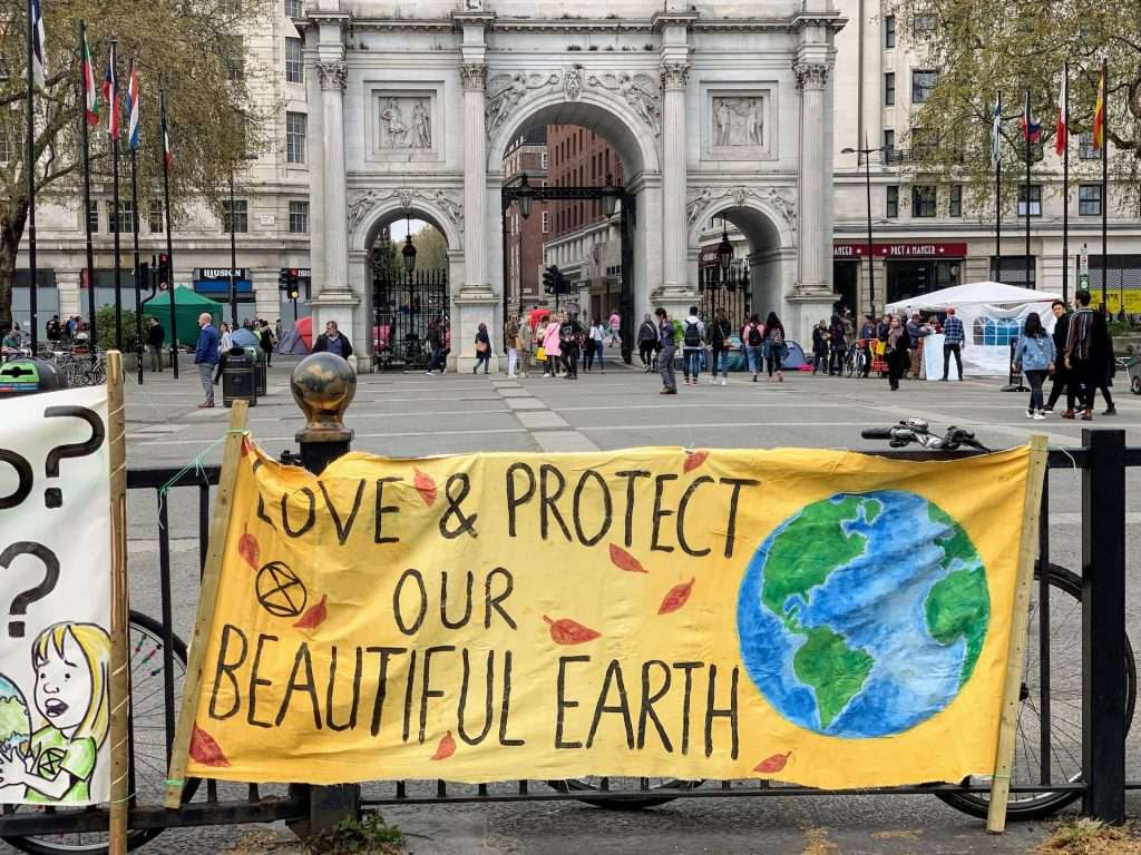 A yellow banner showing love & protect our beautiful earth