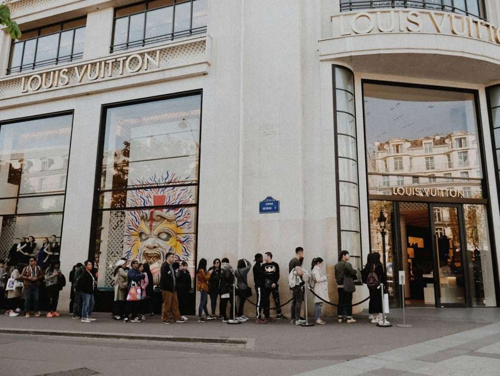 Long queues at Louis Vuitton flagship store at the Champs Champs-Élysées in Paris
