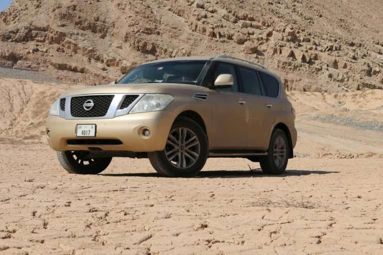 Brown Nissan Patrol in the desert