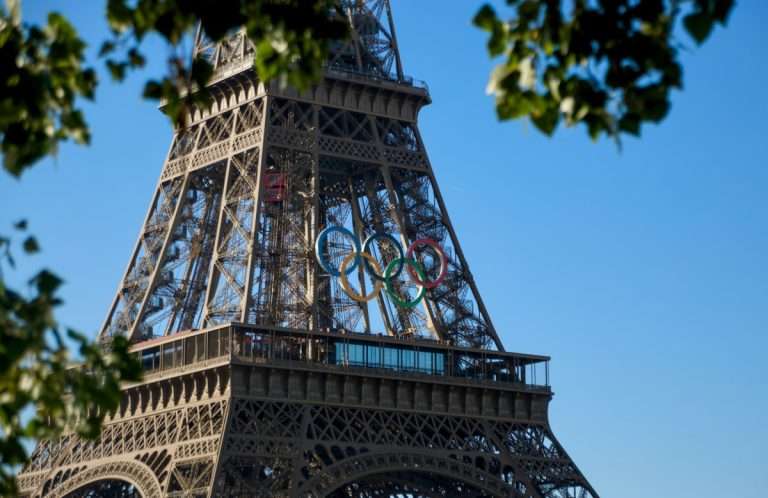 Olympics in Paris 2024 with the Eiffel tower presenting the Olympic rings