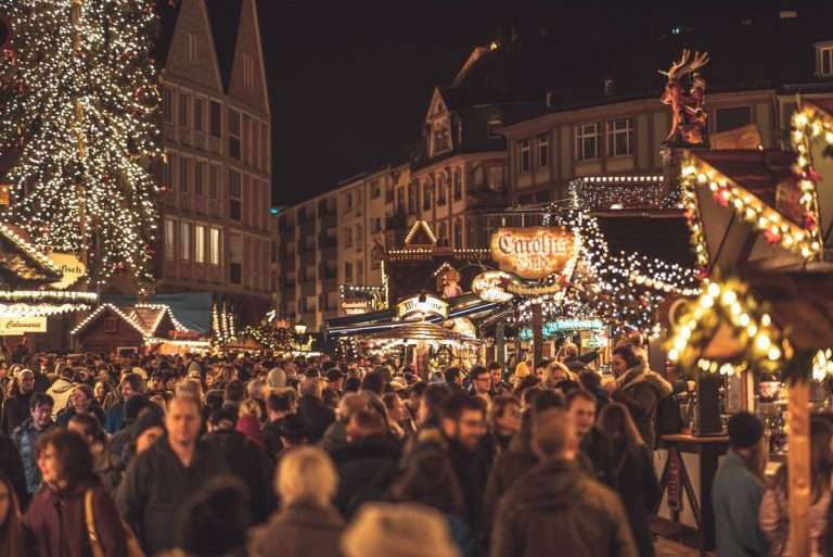 Christmas market in the evening with lots of people
