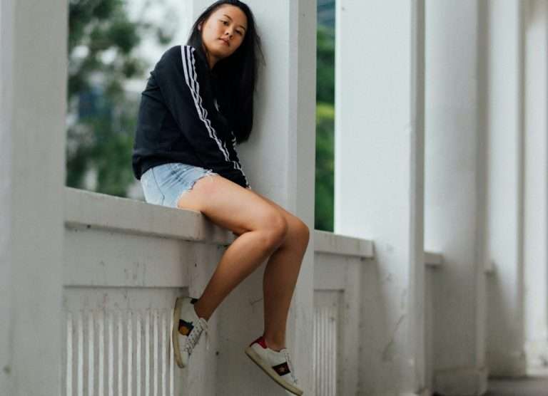 Chinese girl wearing Gucci Ace sneakers