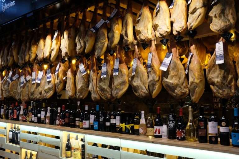 Jamon Iberico and Jamon Serrano hanging in the Jamon Museum in Madrid